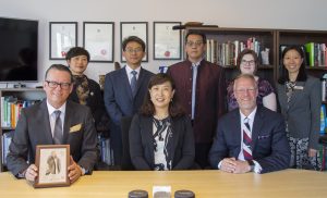 QLNU visits CUE